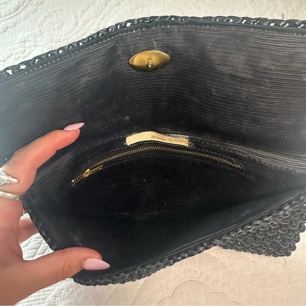 Made in Italy Ratan Beaded Black Clutch.